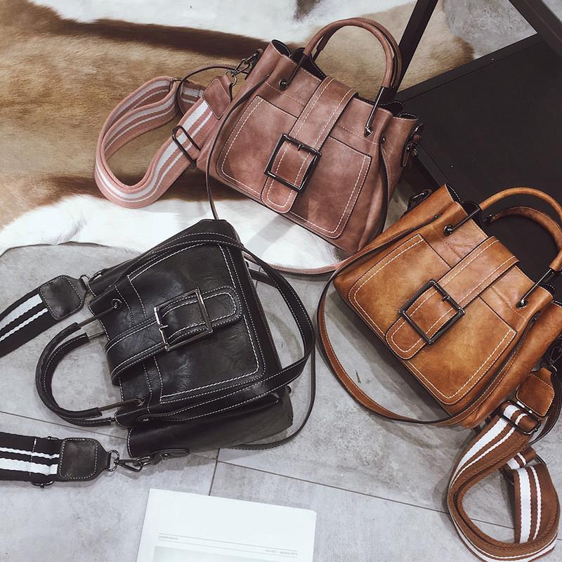 Archaistic bucket bag